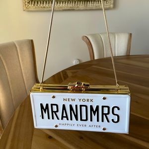 Kate Spade Mr and Mrs license plate clutch